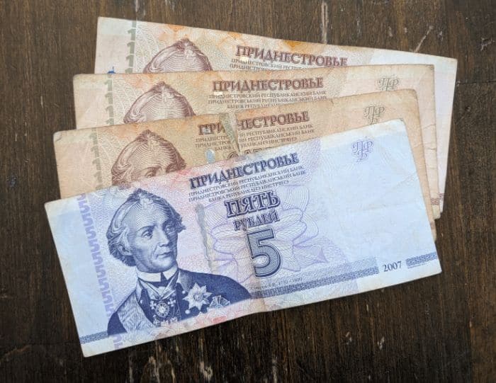 Transnistrian 5 Ruble note, with three 1 Ruble notes behind it