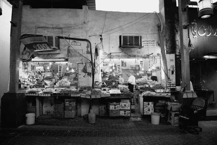 blog Kuwait market shop at night in black and white