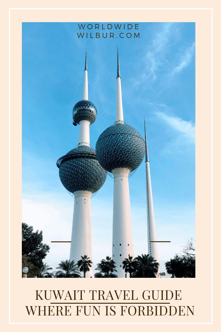 three white spires with green globes in blog Kuwait