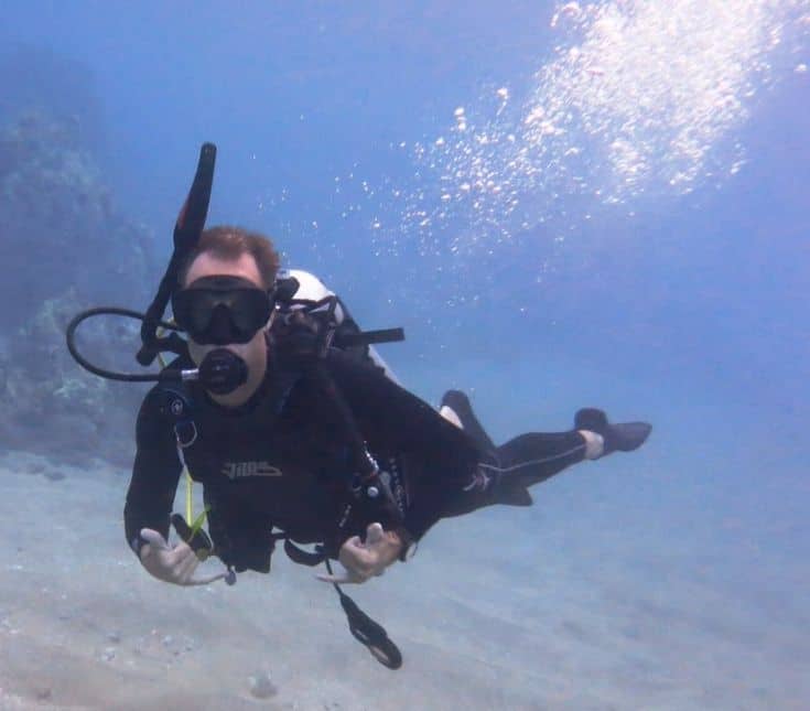 man scuba diving