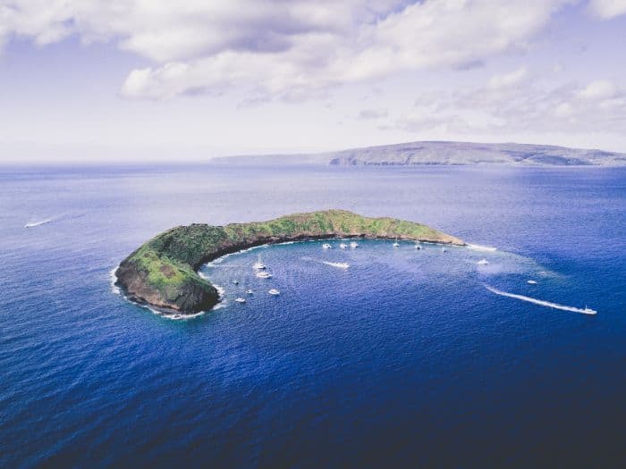 Molokini crater with boats and ocean