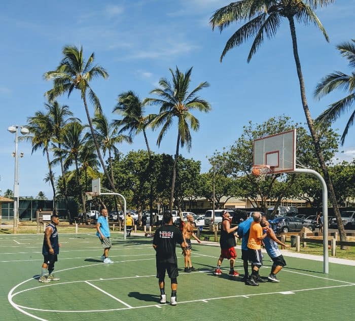 basketball players on green court at Kalama Park Maui Kihei